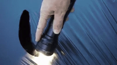 "100000 lumen tactical flashlight with LED, sturdy black aluminum body, LCD power display, ideal for outdoor use."