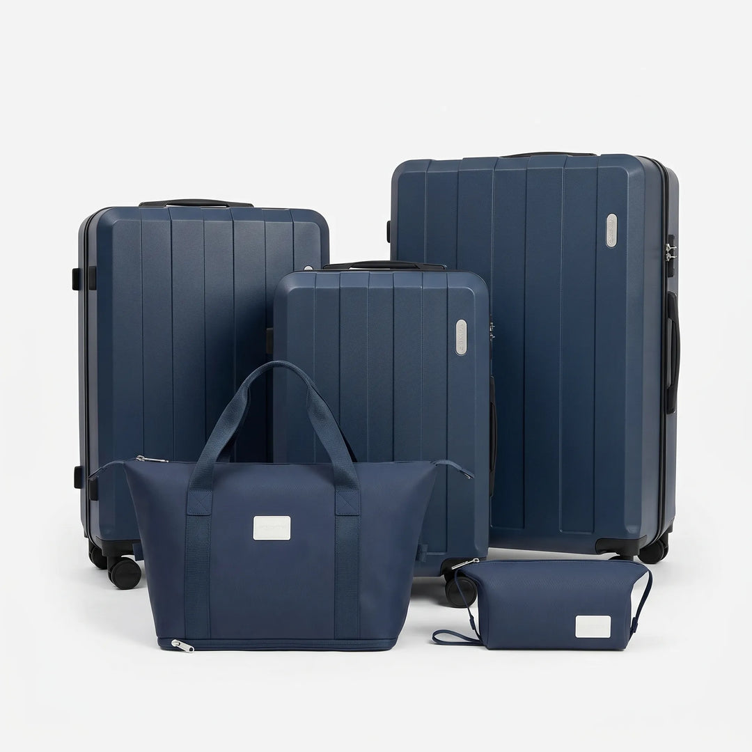 Durable hardshell 5-piece luggage set with smooth spinner wheels for easy travel, includes carry-on & checked bags.