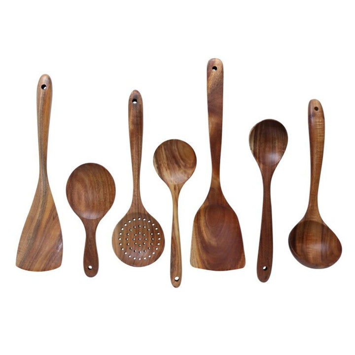 Elegant 7-piece teak wood kitchen utensil set, including a slotted spoon, spatula, and serving tools.