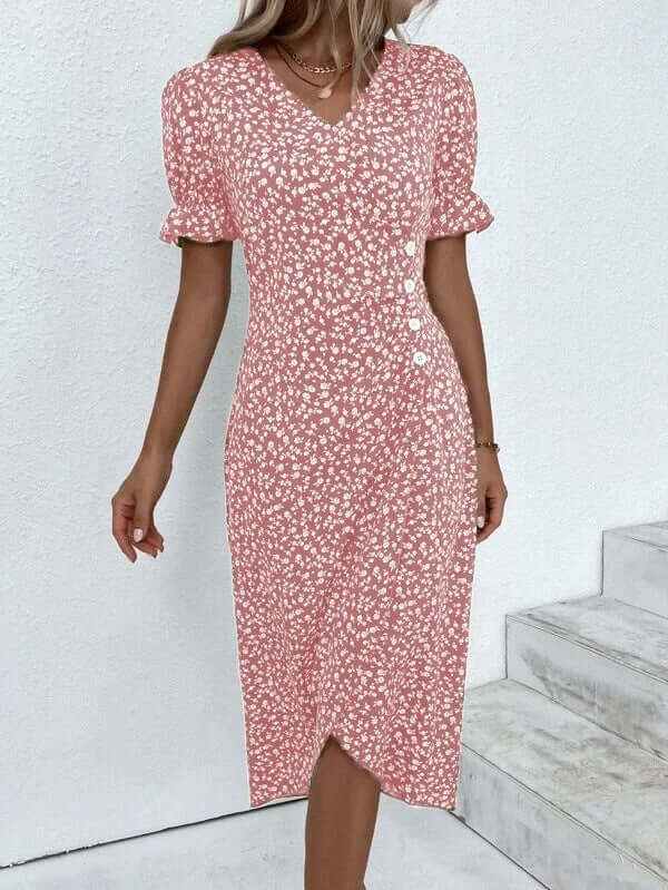 Elegant knee-length summer dress. Its breezy design offers effortless style for any casual occasion.