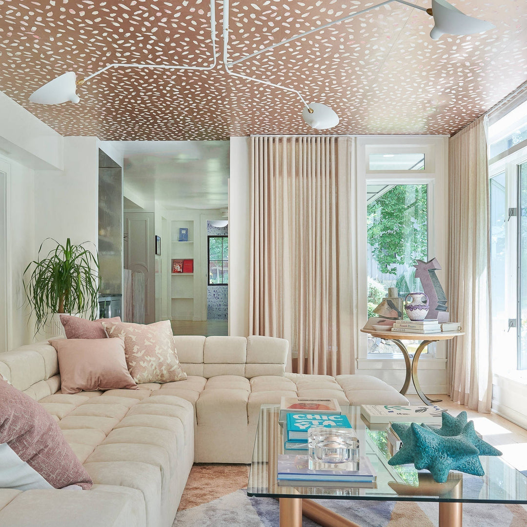 "Adjustable ceiling light with multiple arms, minimalist design, ideal for modern interiors, made of steel and aluminium."