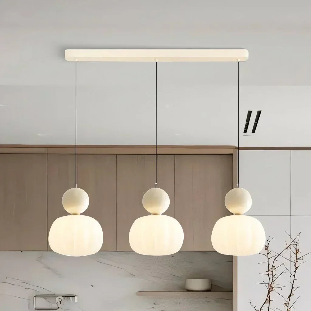 Art Deco Cream Pendant Light with Bauhaus design, featuring a high-quality metal frame and warm glow for elegant home lighting.