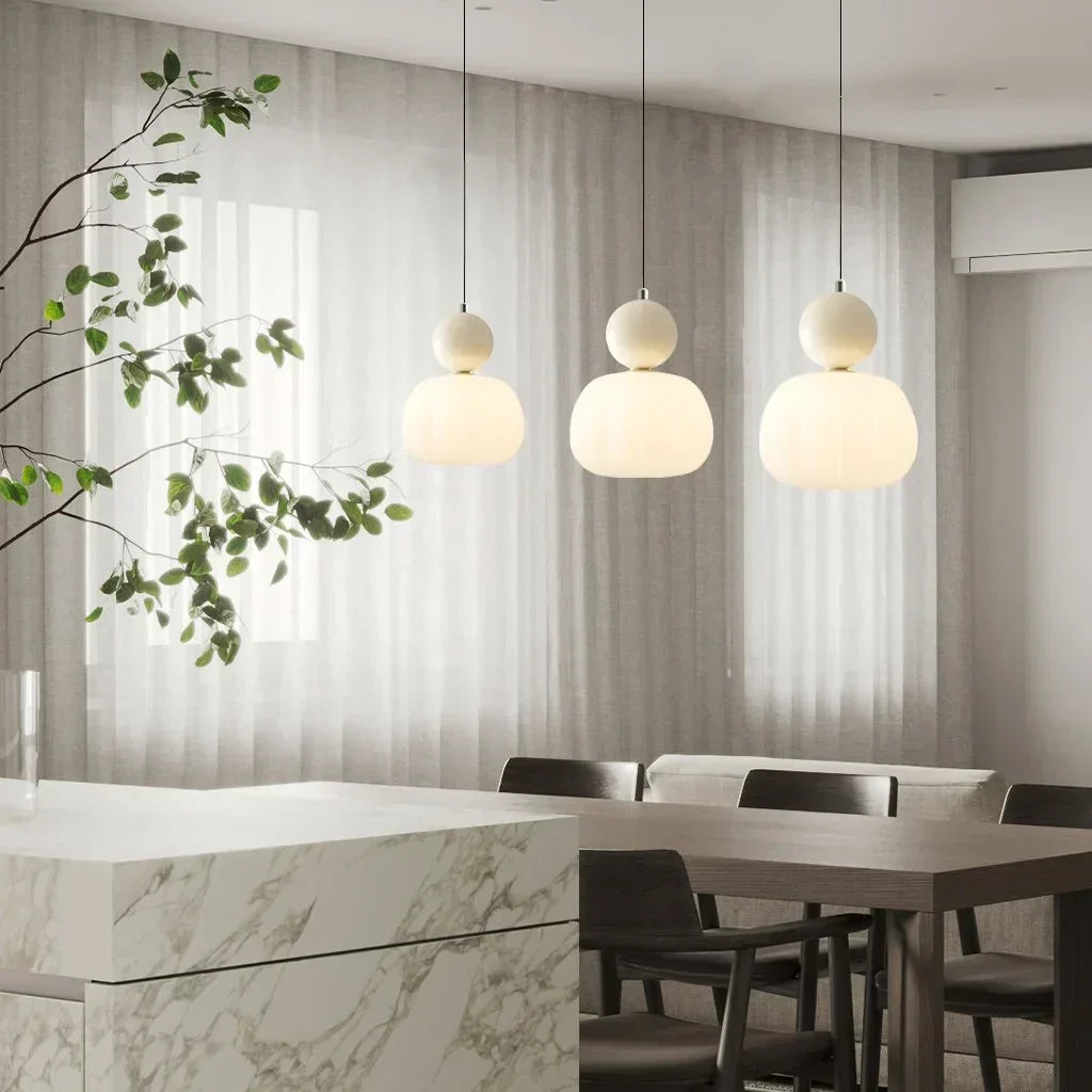 Art Deco Cream Pendant Light with Bauhaus design, featuring a high-quality metal frame and warm glow for elegant home lighting.