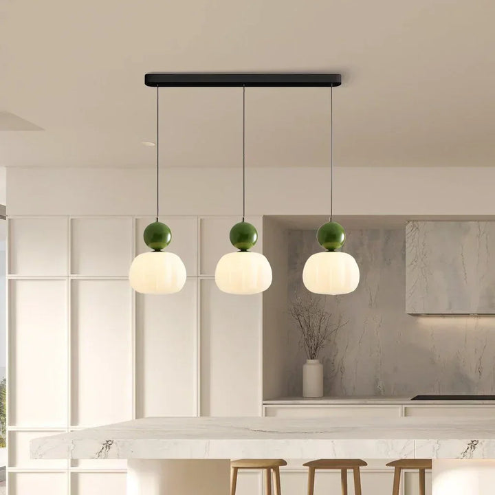 Art Deco Cream Pendant Light with Bauhaus design, featuring a high-quality metal frame and warm glow for elegant home lighting.