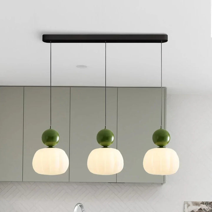 Art Deco Cream Pendant Light with Bauhaus design, featuring a high-quality metal frame and warm glow for elegant home lighting.