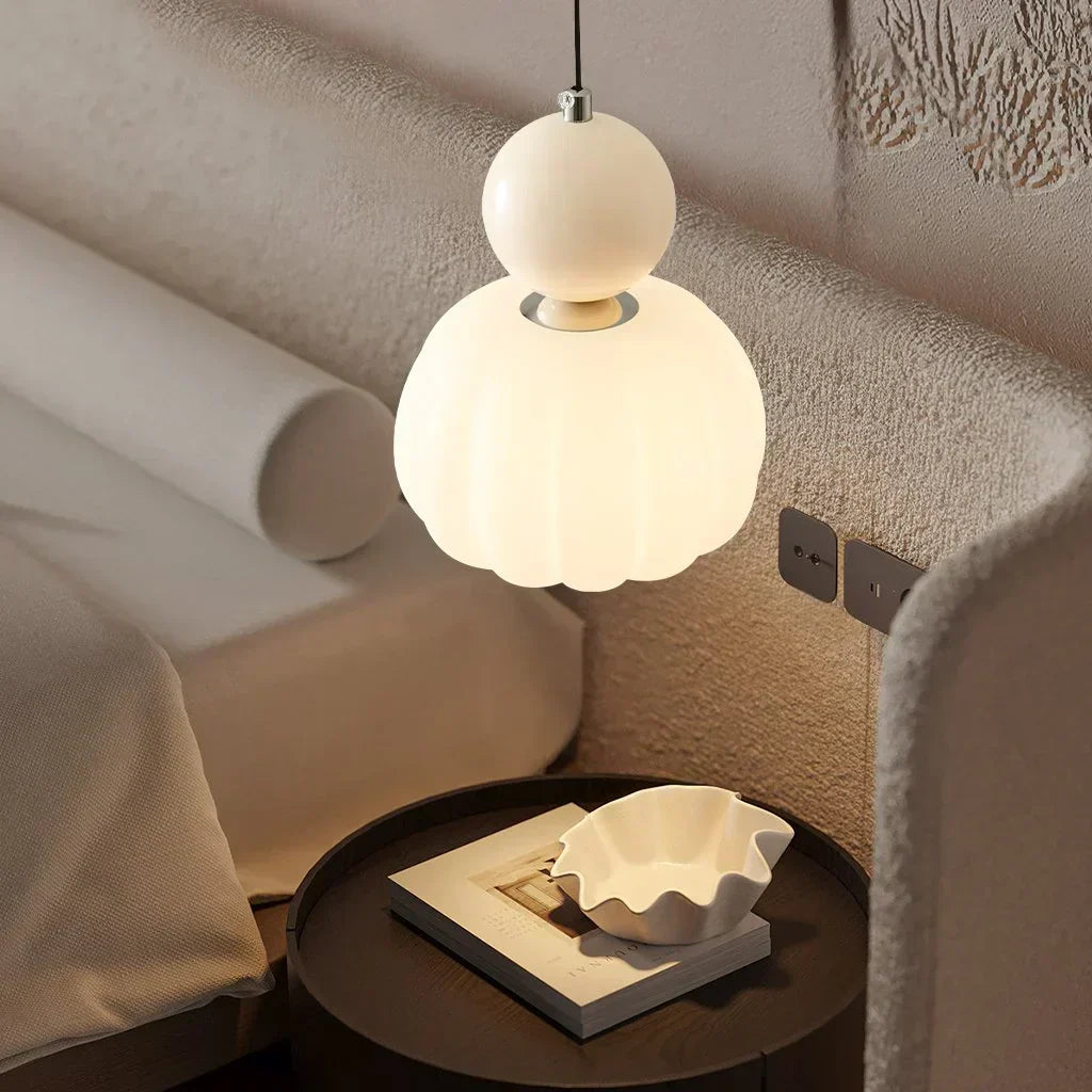 Art Deco Cream Pendant Light with Bauhaus design, featuring a high-quality metal frame and warm glow for elegant home lighting.