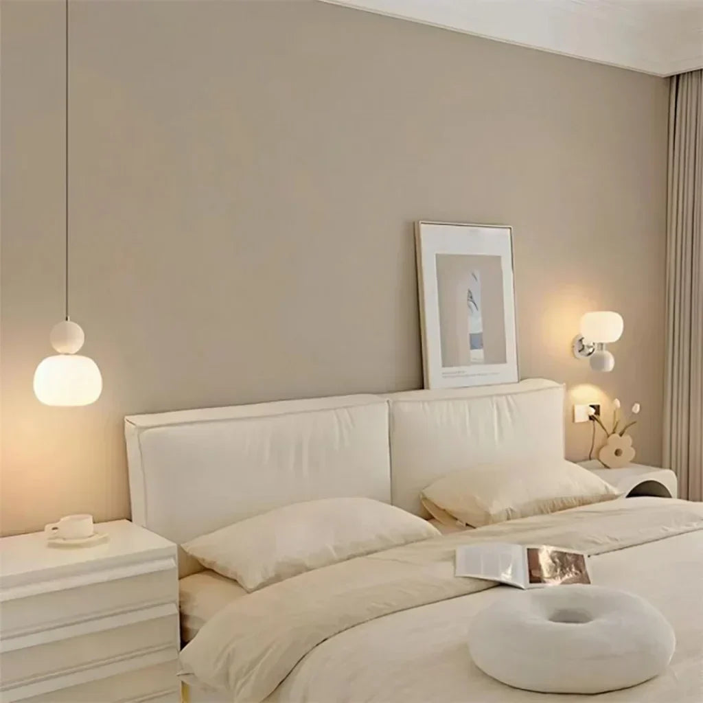 Art Deco Cream Pendant Light with Bauhaus design, featuring a high-quality metal frame and warm glow for elegant home lighting.
