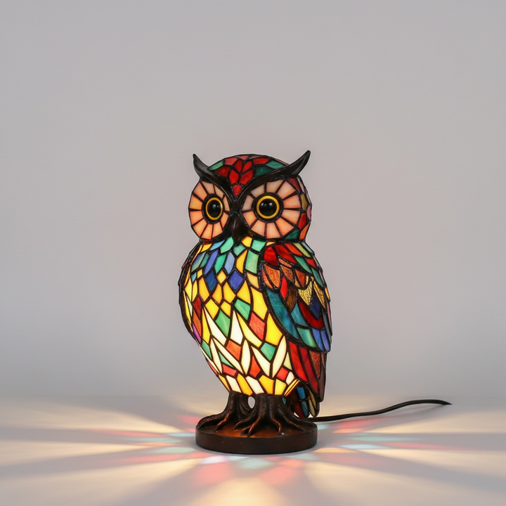 Decorative artistic animal table lamp, stained glass ambient lighting for unique home aesthetics.