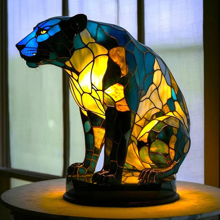 Handcrafted artistic animal lamp, stained glass art providing unique ambient lighting for home decor.