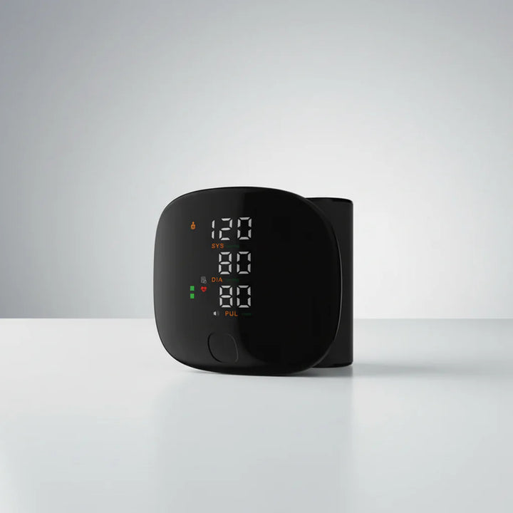 Portable wrist blood pressure monitor with large digital display for convenient health tracking at home.