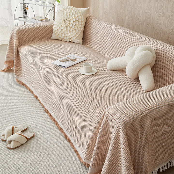 Khaki breathable cotton sofa cover & couch throw for furniture protection, elegant living room decor.