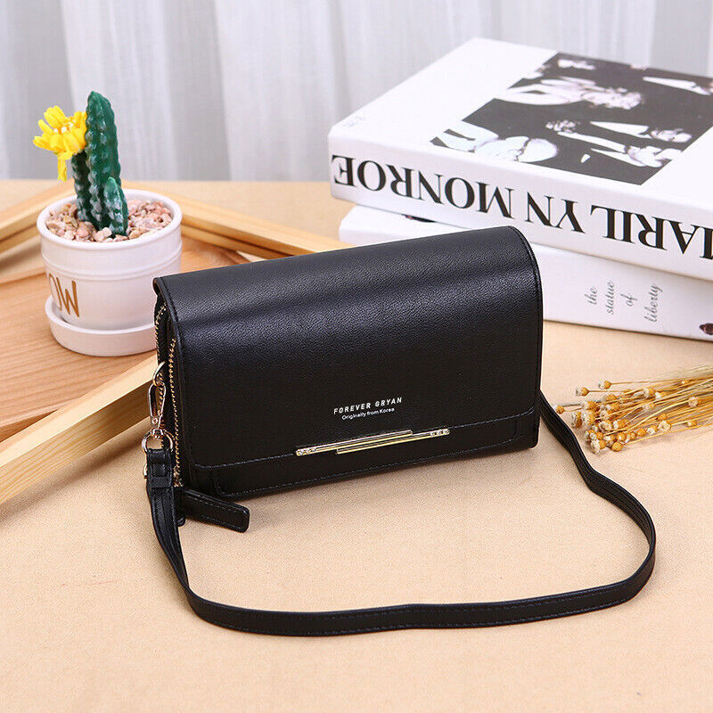 Black leather crossbody wallet bag for women, secure organizer with adjustable strap.