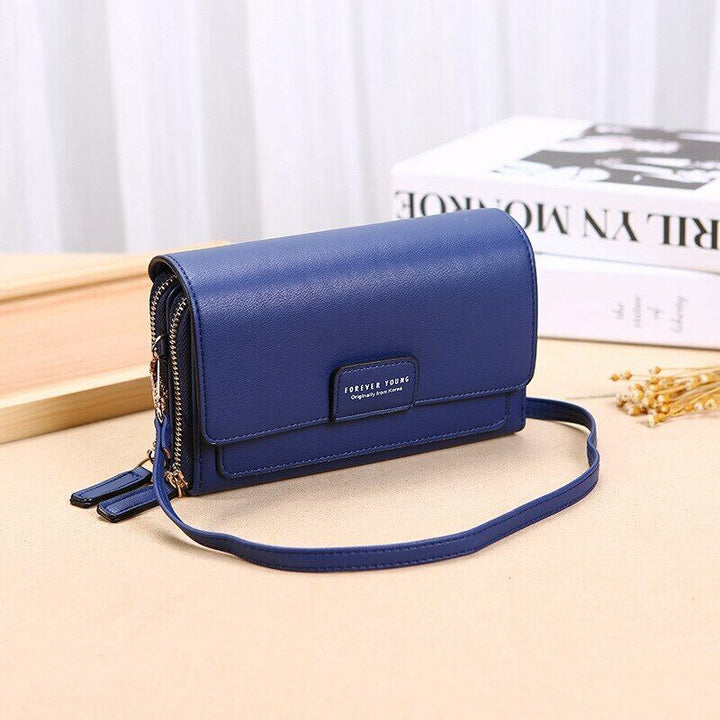 Classic tan leather multi-functional crossbody wallet, perfect for on-the-go organization.