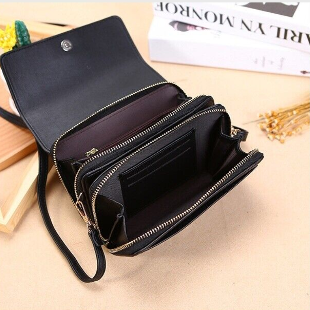 Versatile black leather women's crossbody, hands-free organizer with secure phone pocket.