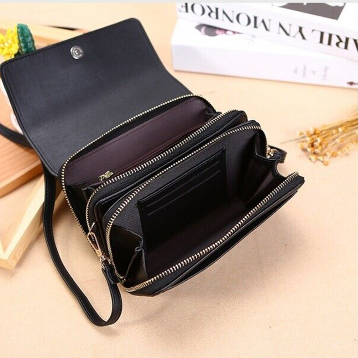 Versatile black leather women's crossbody, hands-free organizer with secure phone pocket.