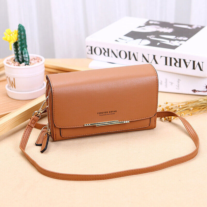 Stylish brown leather women's shoulder bag, multi-functional with card slots & phone pocket.