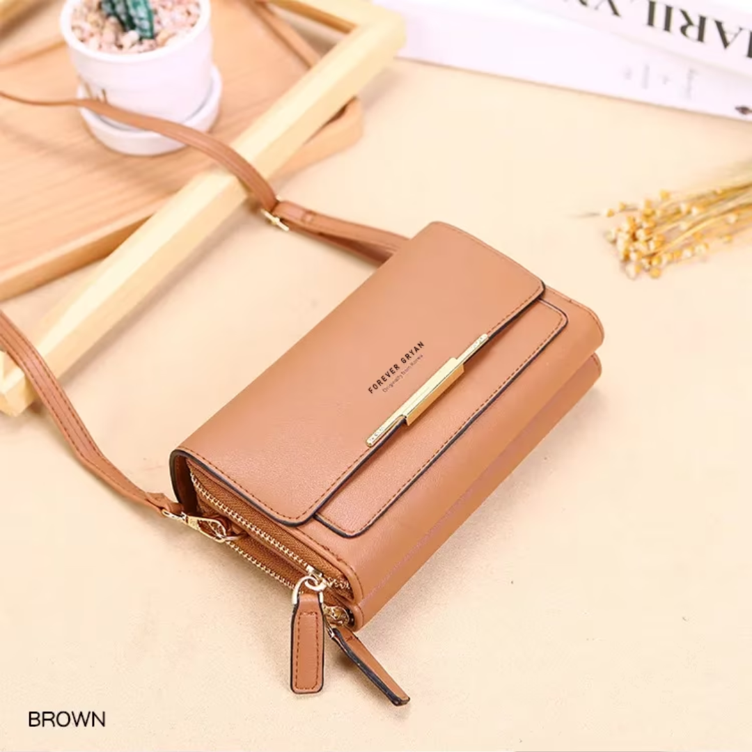 Stylish black leather women's crossbody organizer, with card slots and an adjustable strap.