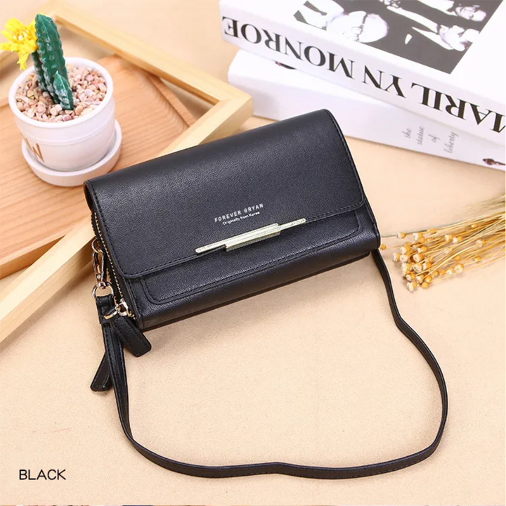 Classic tan leather women's crossbody bag, a durable and stylish everyday organizer.