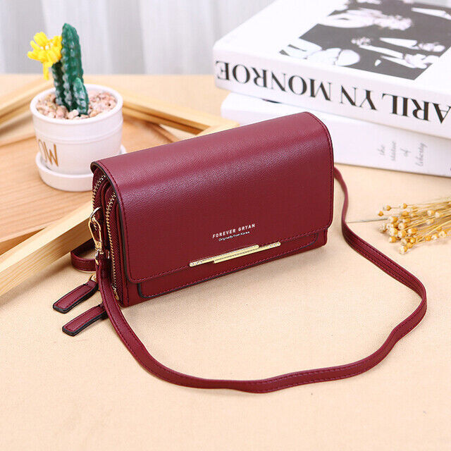 Compact red PU leather crossbody purse, a trendy fashion accessory for modern women.