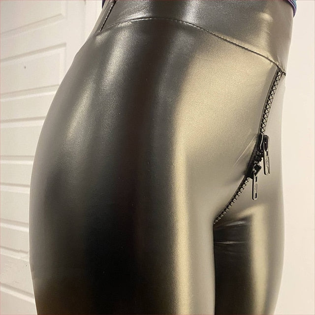 Chic women's high-waisted faux leather pants in matte black, offering an elegant, flattering fit.