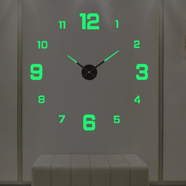 "Black Quartz Wall Clock with sleek design; enhances home decor; modern artistic style; perfect for living room or office."