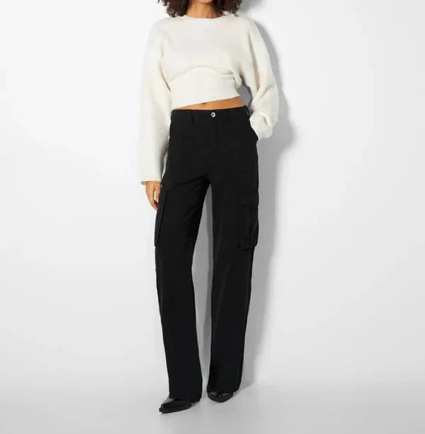 "Black wide-leg women's cargo pants, relaxed fit with functional pockets, versatile style for casual or polished looks."