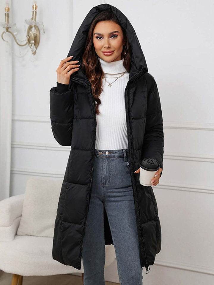 Elegant women's long hooded winter coat, combining style & warmth for chilly days.