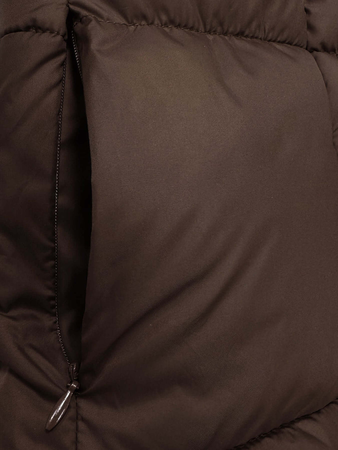 Women's long hooded winter puffer coat in black, essential warm outerwear for women.