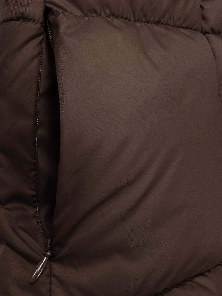 Women's long hooded winter puffer coat in black, essential warm outerwear for women.
