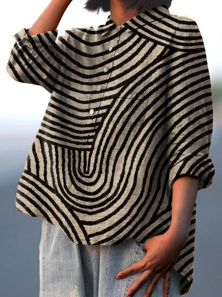 Comfortable black women's blouse for effortless everyday elegance. A versatile top for classic style & workwear.