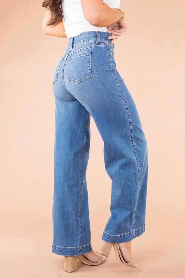 White high-waisted wide-leg denim jeans for women, offering a chic, relaxed fit & versatile style.