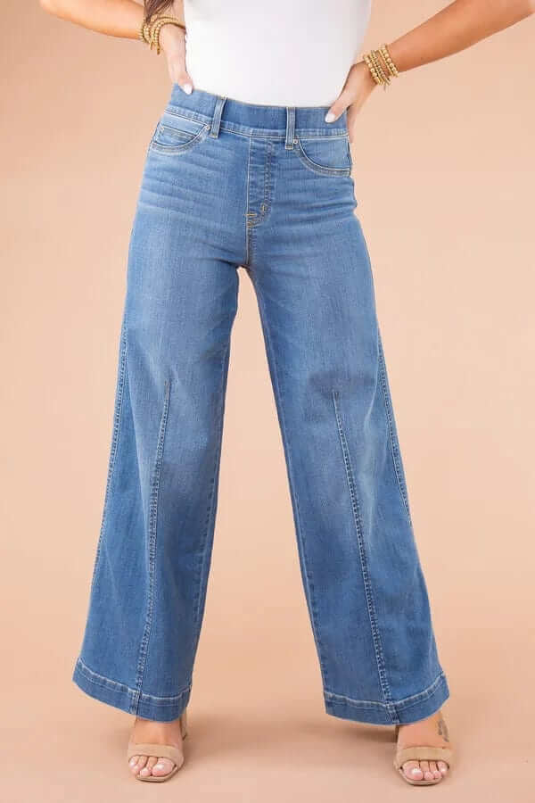 Comfortable women's wide-leg jeans with a high waist, made from quality denim for a relaxed fit.