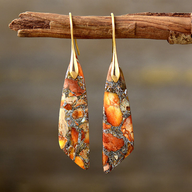 Elegant handcrafted bohemian drop earrings. Versatile women's fashion accessory with unique details.