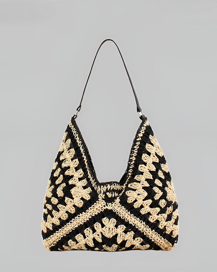 Chic women's boho crochet shoulder bag, a unique artisan handbag with a geometric design, perfect for fashion-forward women.