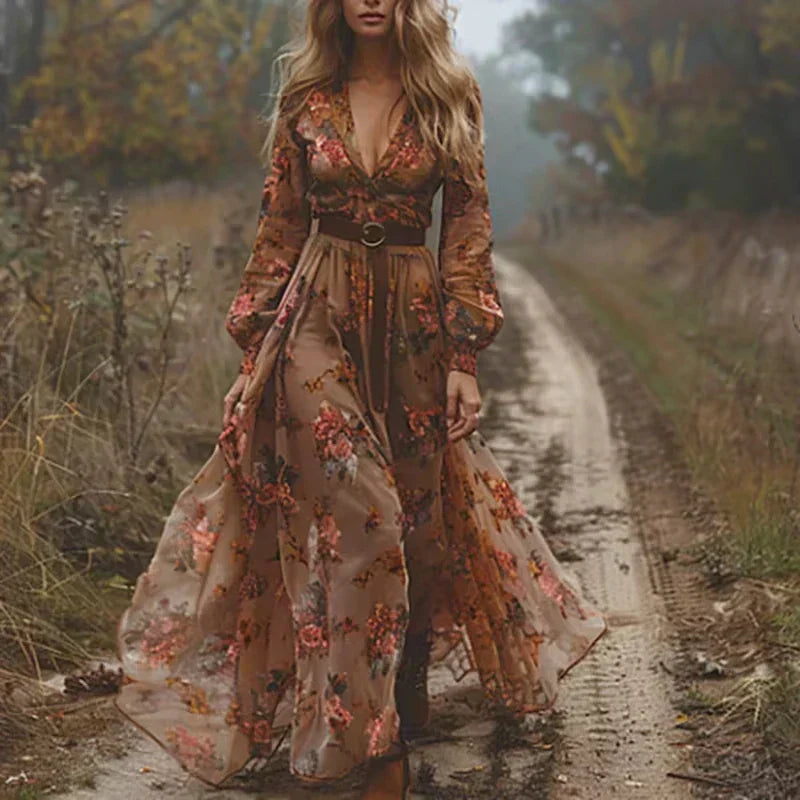 Boho long sleeve floral maxi dress with tiered skirt, featuring vibrant floral print; women's flowing fit for multiple occasi