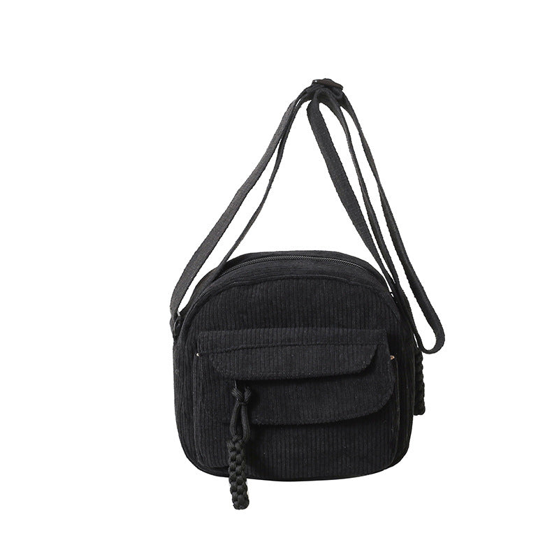Neutral beige vintage style small shoulder bag for women, featuring a practical front zip pocket.