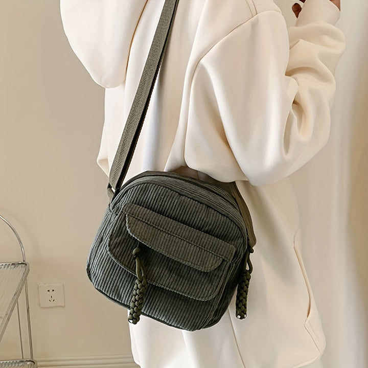 Women's green vintage style small crossbody bag, perfect for essentials & hands-free use.