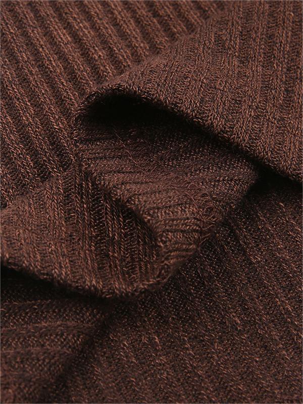 Close-up of the textured fabric and button-front detail on a brown women's V-neck long sleeve top.