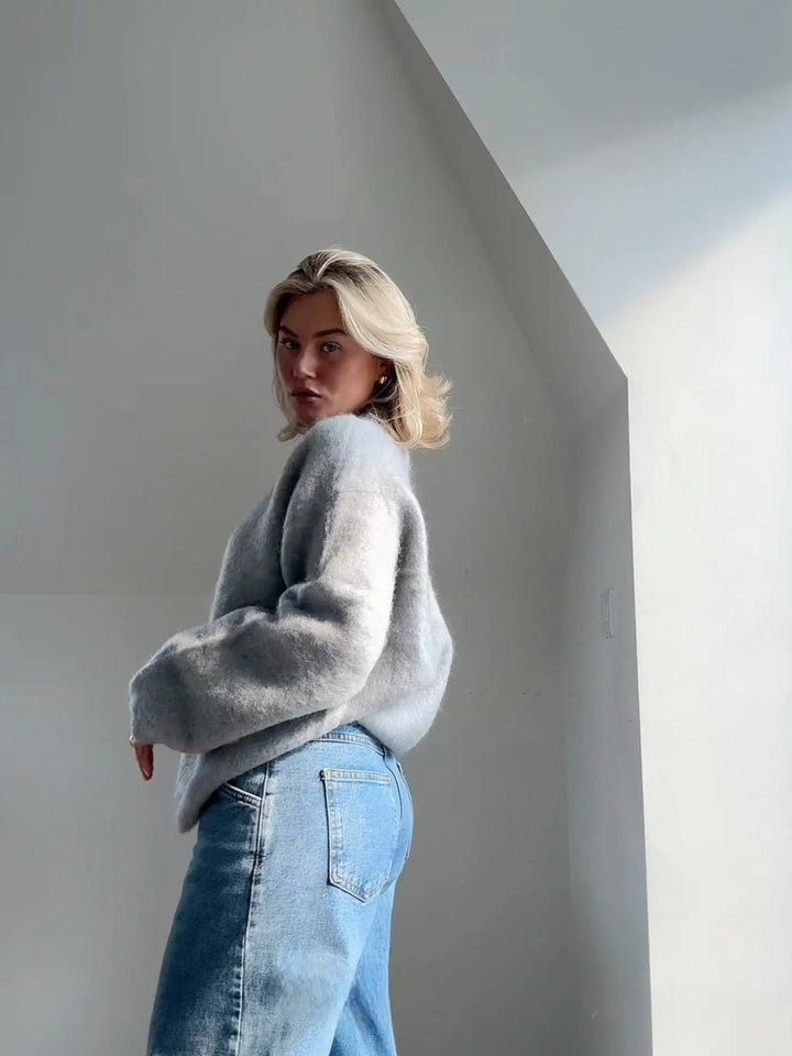 Chic and versatile women's elegant pullover, a relaxed fit grey sweater for cozy style.