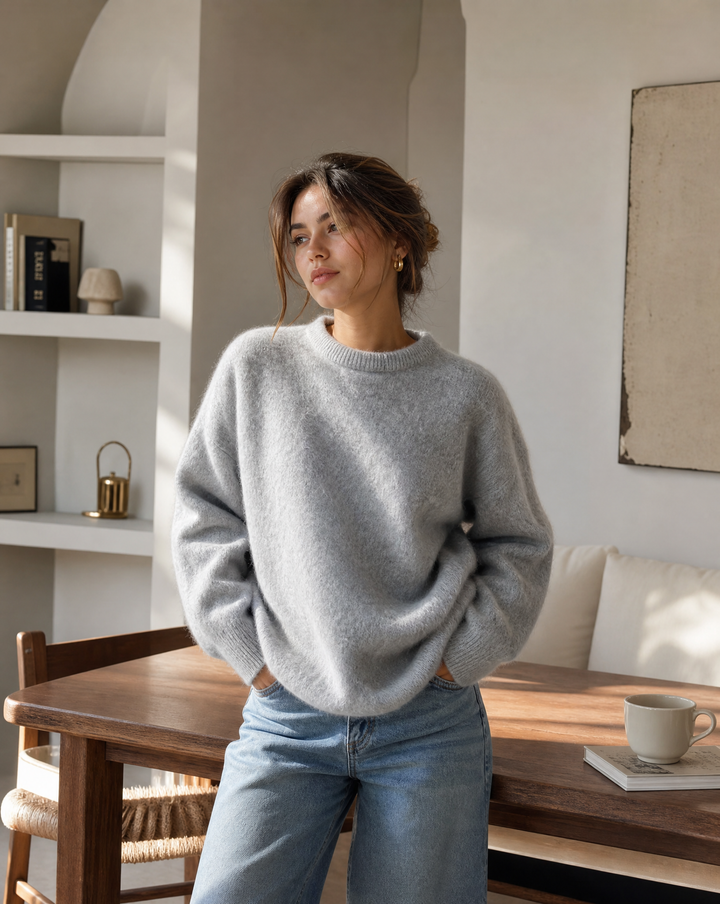 Chic cream women's relaxed fit pullover sweater, comfortable and sophisticated for everyday elegance.