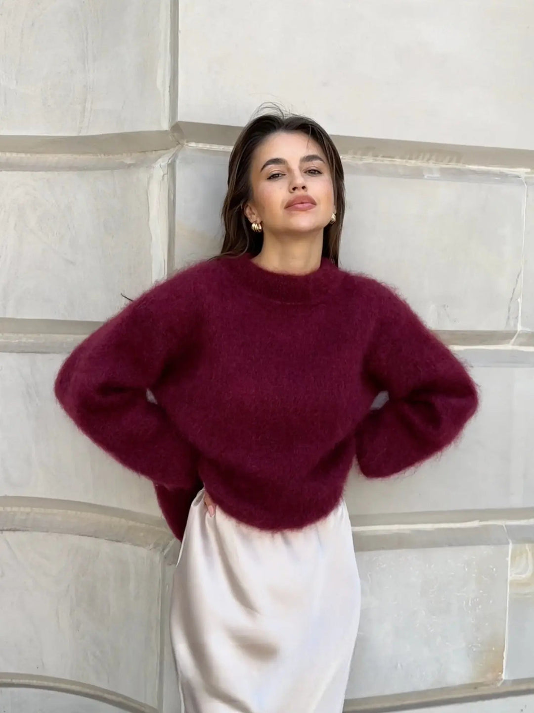 Comfortable women's relaxed fit sweater, perfect for elegant layering and cozy sophistication.