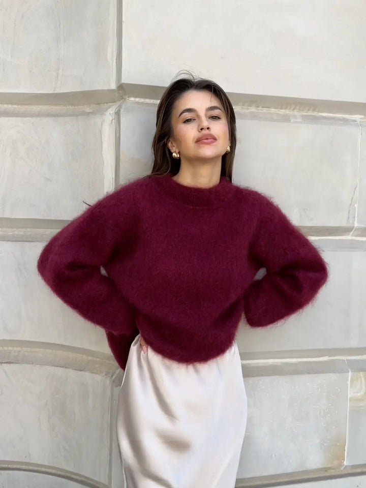 Comfortable women's relaxed fit sweater, perfect for elegant layering and cozy sophistication.