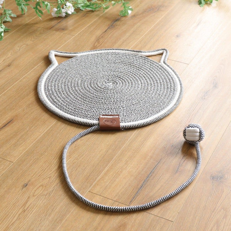 "Cat lounging on stylish, durable cat scratching rug; elegant, textured mat for optimal claw care and furniture protection."