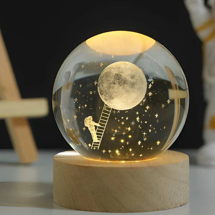 Perfectly round CelestialGlow Luminous Sphere, an elegant 3D engraved celestial light for your desk.