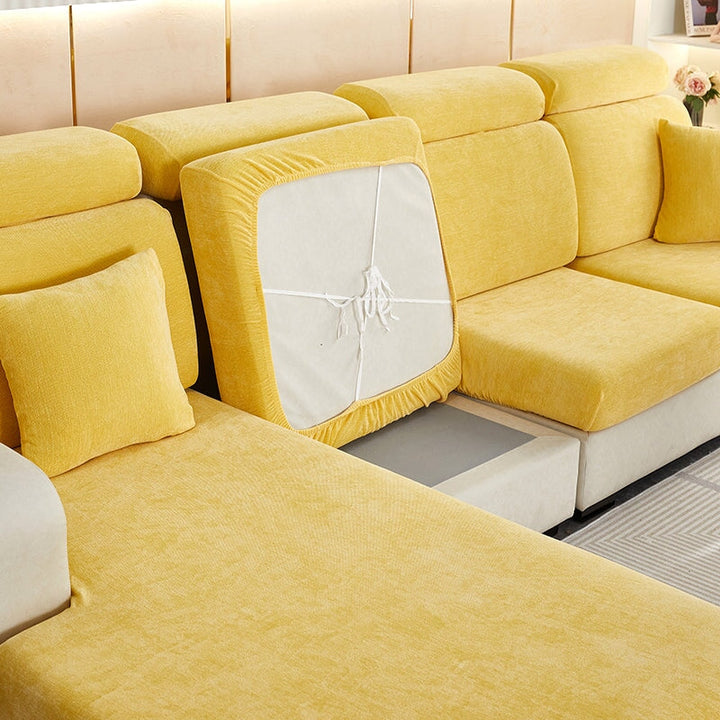 "Chenille sectional sofa cover in smoke color, fits snugly on sectional sofas to protect against wear, spills, and stains."