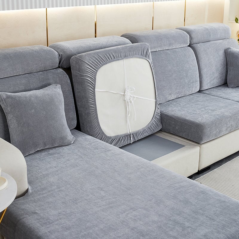 "Chenille sectional sofa cover in smoke color, fits snugly on sectional sofas to protect against wear, spills, and stains."