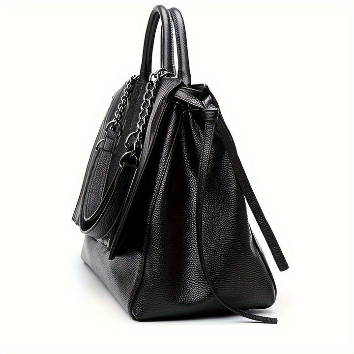 Chic black shoulder bag for women, sleek and spacious; ideal for office and casual use, complements all outfits.