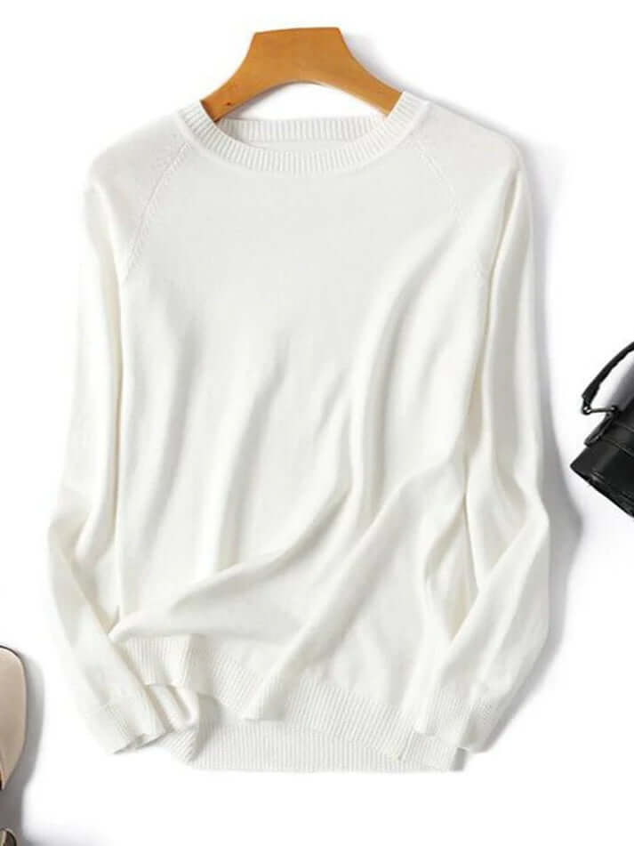 Stylish women's striped knitted pullover sweater, offering a chic and cozy autumn winter style.