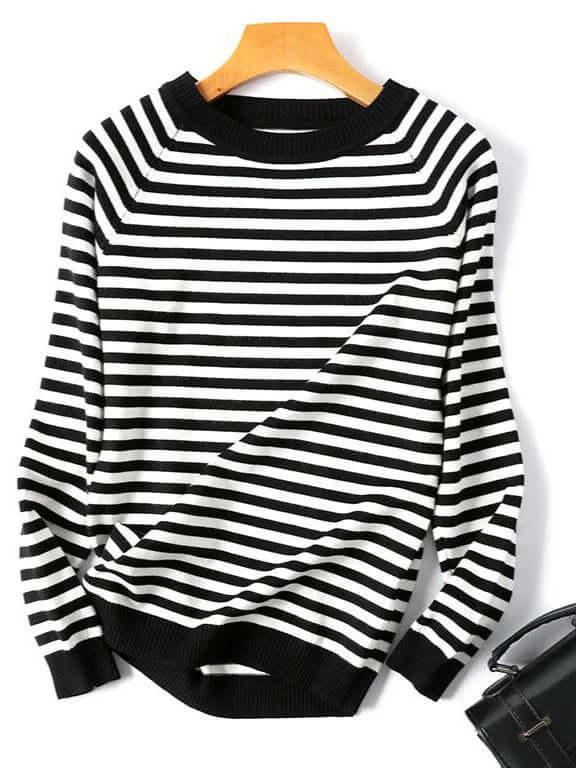 Soft knitted women's striped pullover sweater. Cozy long sleeve top for autumn and winter fashion.