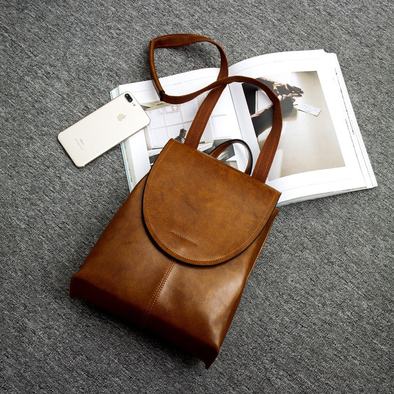 Earth yellow women's burnished leather backpack, perfect blend of style & function for any journey.